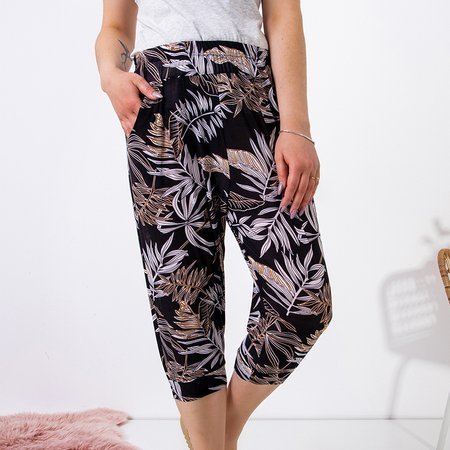 Black women's shorts with a floral print PLUS SIZE - Clothing