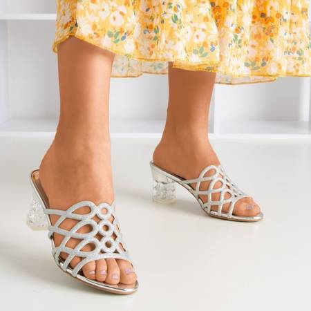 Silver slippers on higher transparent Cinderella post - Footwear