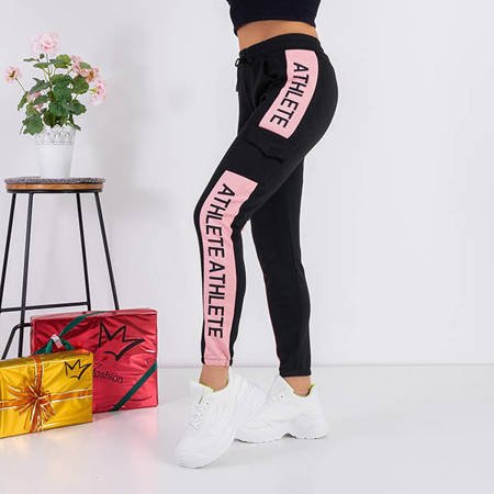Women's black sweatpants with pink inserts - Clothing