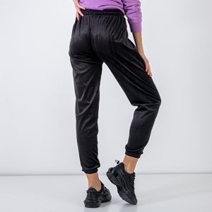 Black women's sweatpants with an embroidered inscription - Clothing