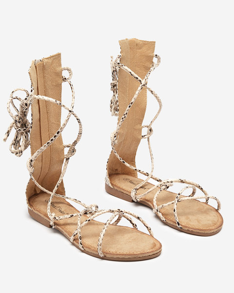 Calf-length gladiator sandals with Yenise beige embossing - Footwear