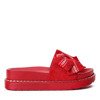Red flip-flops on a thick platform with a decorative bow Elemi - Footwear 1