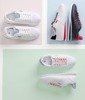 Women's white sports shoes with red Dramena inserts - Footwear